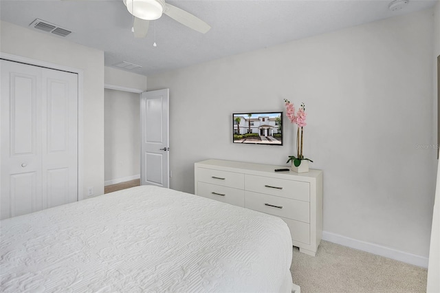 1578 Slice Way, Davenport, FL 33896 - bedroom featuring light carpet, a closet, and a ceiling fan