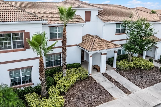 1578 Slice Way, Davenport, FL 33896 - view of front facade with stucco siding and a tiled roof