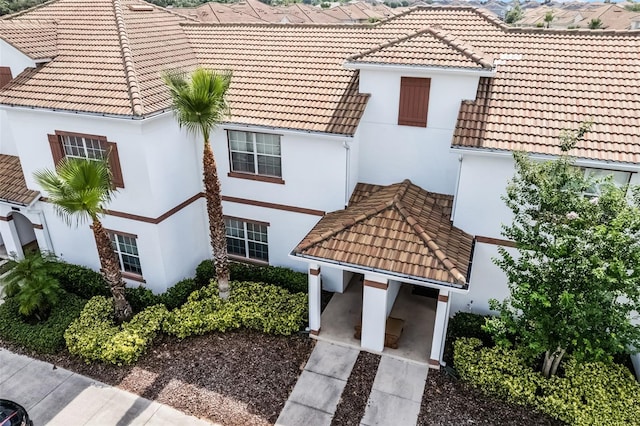 1578 Slice Way, Davenport, FL 33896 - exterior space featuring a tiled roof and stucco siding