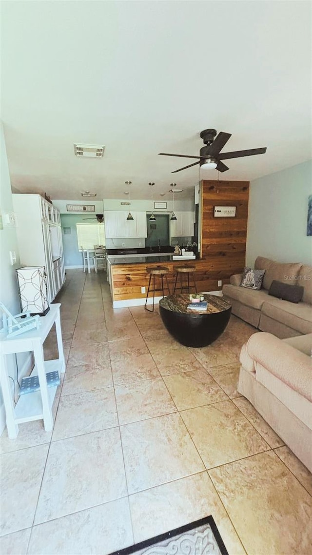 745 17th Ave, Vero Beach, FL 32962 - living room featuring a ceiling fan