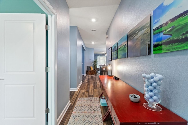 1064 Quaker Ridge Ln, Davenport, FL 33896 - hallway featuring wood finished floors, a textured wall, recessed lighting, and baseboards