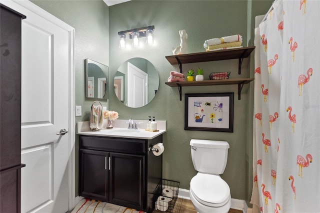 1064 Quaker Ridge Ln, Davenport, FL 33896 - bathroom with vanity, toilet, a shower with curtain, baseboards, and a textured wall