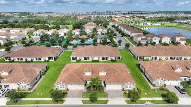 1064 Quaker Ridge Ln, Davenport, FL 33896 - aerial perspective of suburban area featuring a large body of water