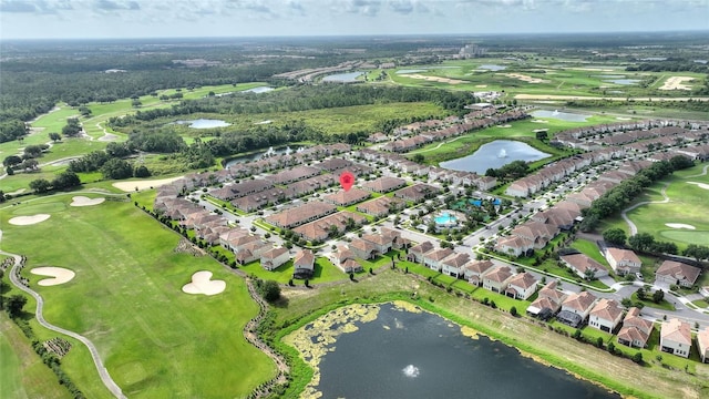 1064 Quaker Ridge Ln, Davenport, FL 33896 - aerial overview of property's location featuring a large body of water, nearby suburban area, and a local golf course
