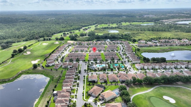 1064 Quaker Ridge Ln, Davenport, FL 33896 - aerial overview of property's location with nearby suburban area, a large body of water, a golf course, and a heavily wooded area