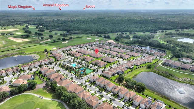 1064 Quaker Ridge Ln, Davenport, FL 33896 - aerial view of property and surrounding area featuring a large body of water, a golf club, nearby suburban area, and a forest