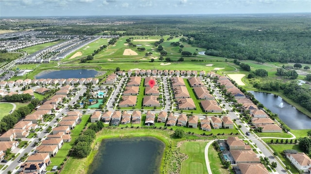 1064 Quaker Ridge Ln, Davenport, FL 33896 - aerial view of property's location featuring a golf club, a nearby body of water, and nearby suburban area