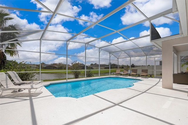 2503 Calla Lily Cv, Kissimmee, FL 34758 - outdoor pool with a patio area, a water view, and a lanai