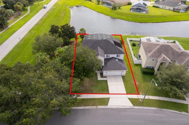 2503 Calla Lily Cv, Kissimmee, FL 34758 - aerial view of residential area with a large body of water and property parcel outlined