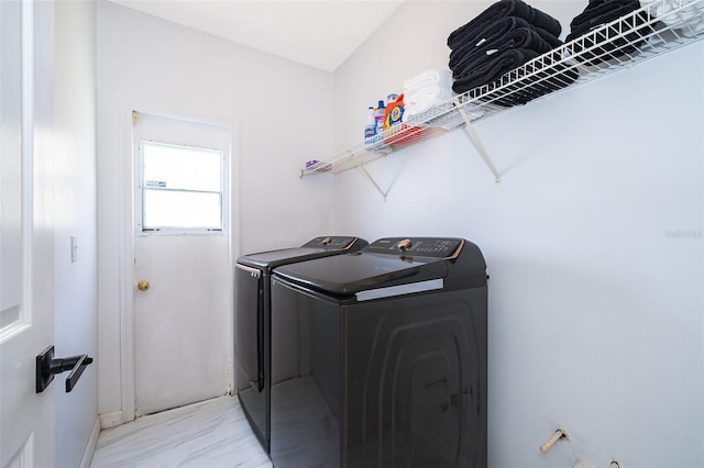 2503 Calla Lily Cv, Kissimmee, FL 34758 - washroom with separate washer and dryer