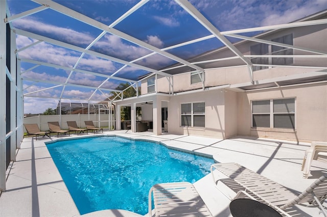 2503 Calla Lily Cv, Kissimmee, FL 34758 - view of swimming pool featuring a patio area and glass enclosure