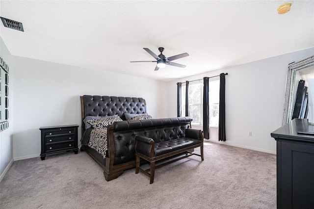 2503 Calla Lily Cv, Kissimmee, FL 34758 - bedroom featuring light carpet, a ceiling fan, and baseboards