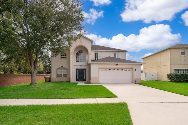 2503 Calla Lily Cv, Kissimmee, FL 34758 - view of front of property featuring stucco siding, a garage, concrete driveway, and a shingled roof