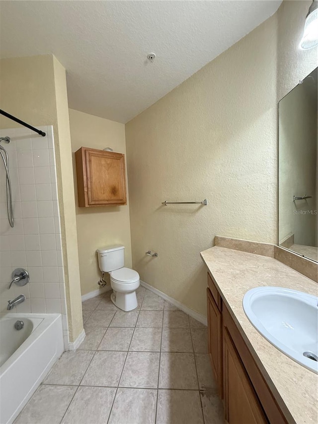 6169 Metrowest Blvd Unit 208, Orlando, FL 32835 - bathroom featuring vanity, shower / tub combination, tile patterned floors, a textured ceiling, and a textured wall