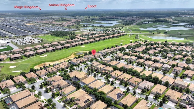 1353 Palmetto Dunes St, Davenport, FL 33836 - aerial view of property and surrounding area with a local golf course and nearby suburban area
