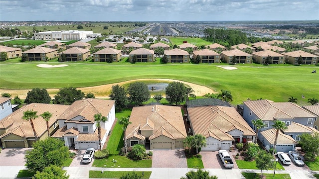 1353 Palmetto Dunes St, Davenport, FL 33836 - aerial view of residential area with a golf course