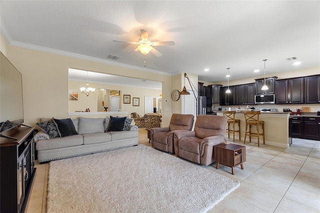 1353 Palmetto Dunes St, Davenport, FL 33836 - living area featuring light tile patterned floors, a chandelier, crown molding, and a ceiling fan