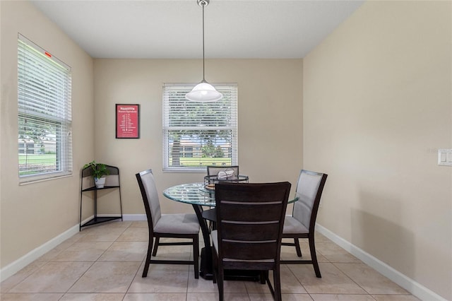 1353 Palmetto Dunes St, Davenport, FL 33836 - dining area featuring plenty of natural light and light tile patterned flooring