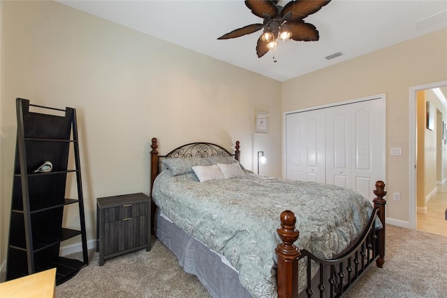 1353 Palmetto Dunes St, Davenport, FL 33836 - bedroom with light colored carpet, a closet, and a ceiling fan