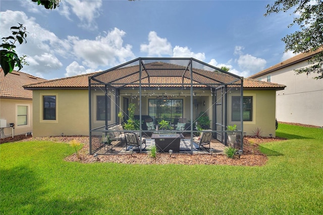 1353 Palmetto Dunes St, Davenport, FL 33836 - back of house featuring stucco siding, a patio, a lawn, a tiled roof, and glass enclosure