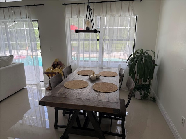 416 Sea Willow Dr, Kissimmee, FL 34743 - dining area featuring baseboards