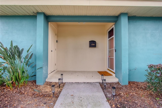4768 Tangerine Ave Unit 4768, Winter Park, FL 32792 - doorway to property with stucco siding