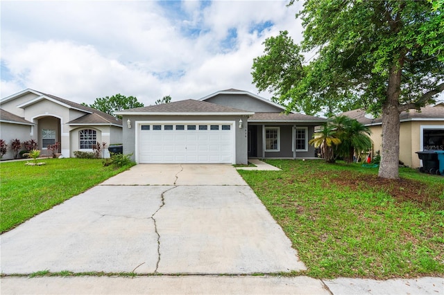 1659 Sage Creek Ct, Orlando, FL 32824 - ranch-style house featuring a garage, stucco siding, driveway, a front yard, and roof with shingles