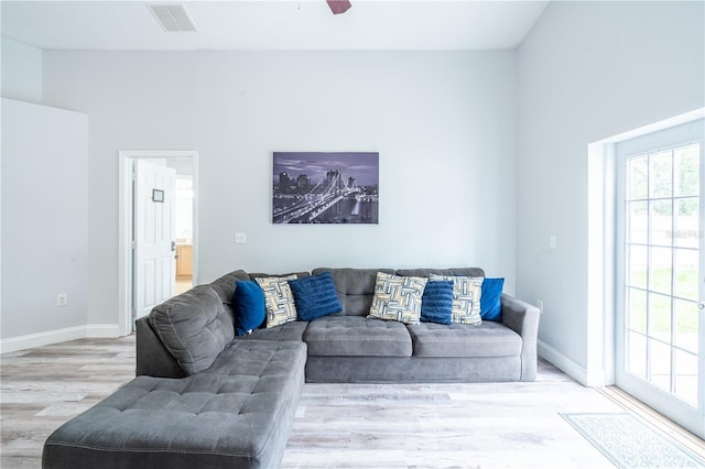 1659 Sage Creek Ct, Orlando, FL 32824 - living room featuring wood finished floors, baseboards, and a ceiling fan