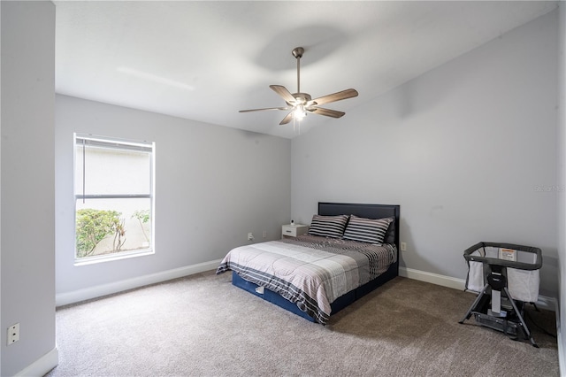 1659 Sage Creek Ct, Orlando, FL 32824 - carpeted bedroom with baseboards, vaulted ceiling, and ceiling fan