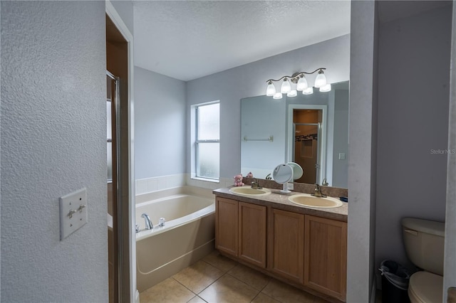 1659 Sage Creek Ct, Orlando, FL 32824 - full bath with a bath, tile patterned flooring, toilet, double vanity, and a shower stall