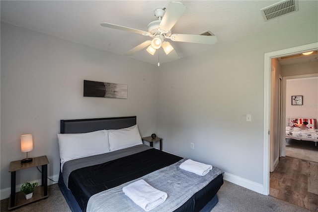 1659 Sage Creek Ct, Orlando, FL 32824 - bedroom with baseboards, a ceiling fan, and carpet floors