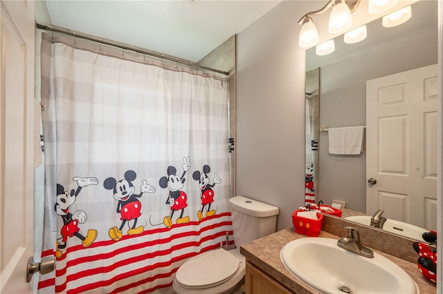 1659 Sage Creek Ct, Orlando, FL 32824 - full bathroom featuring toilet, vanity, and a shower with curtain