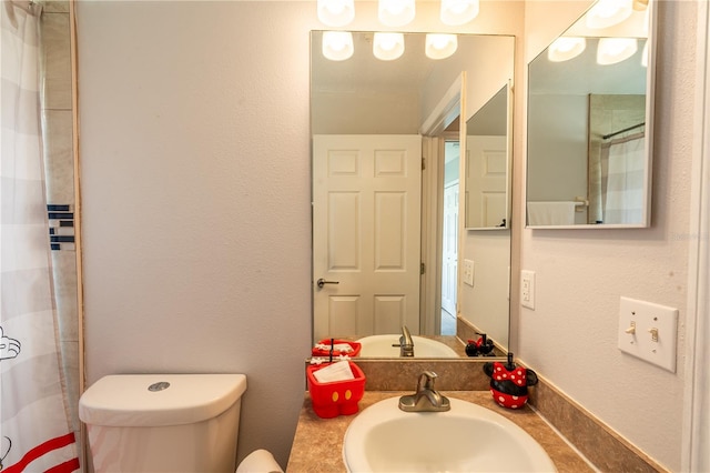 1659 Sage Creek Ct, Orlando, FL 32824 - bathroom featuring toilet and vanity