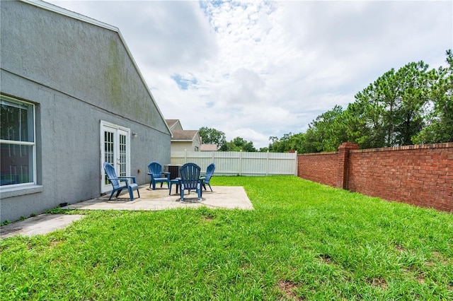 1659 Sage Creek Ct, Orlando, FL 32824 - view of yard featuring a patio