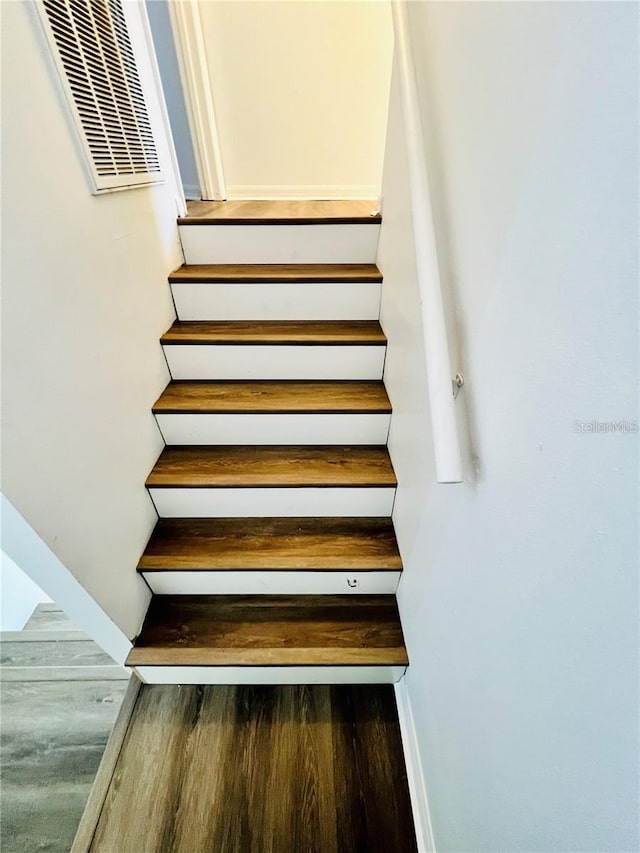 658 Caribbean Dr Unit 658, Davenport, FL 33897 - staircase featuring wood finished floors