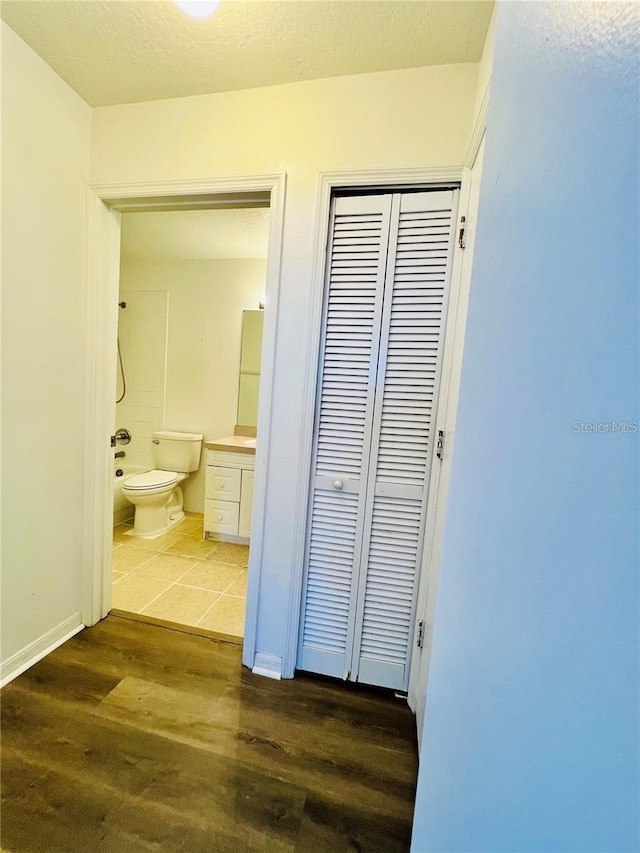 658 Caribbean Dr Unit 658, Davenport, FL 33897 - hallway featuring wood finished floors