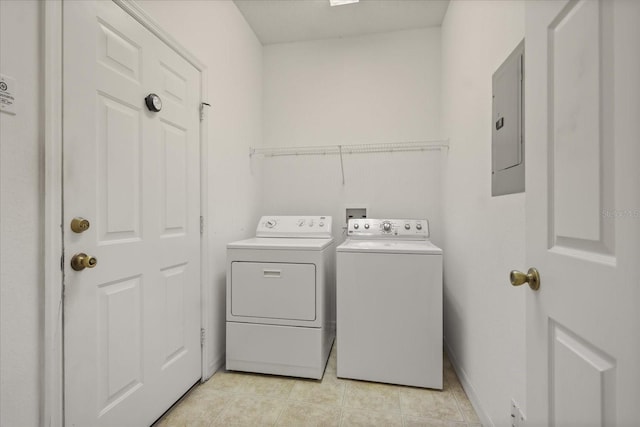 2050 Island Walk Dr, Orlando, FL 32824 - laundry room with independent washer and dryer, electric panel, and light tile patterned flooring