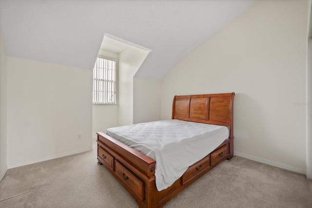 2050 Island Walk Dr, Orlando, FL 32824 - bedroom featuring lofted ceiling and light colored carpet