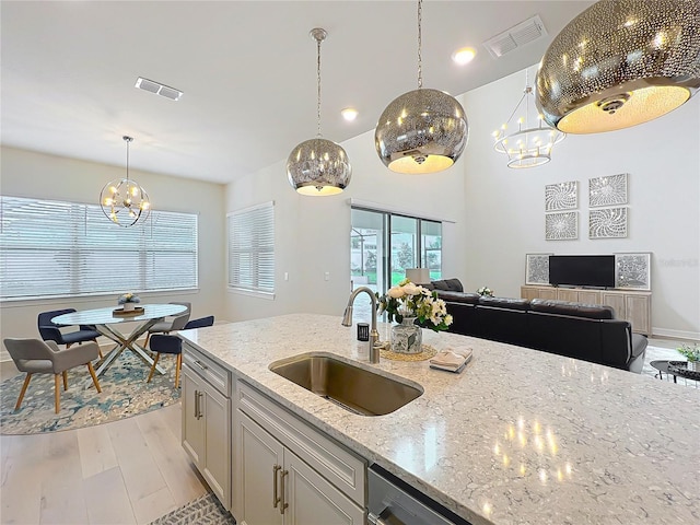 9071 Woodland Forest Rd, Orlando, FL 32836 - kitchen with a chandelier, plenty of natural light, and open floor plan