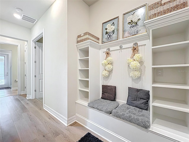 9071 Woodland Forest Rd, Orlando, FL 32836 - mudroom featuring wood finished floors