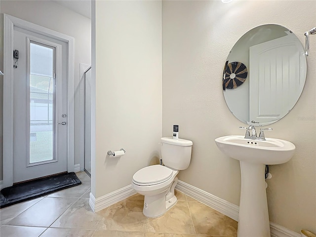 9071 Woodland Forest Rd, Orlando, FL 32836 - bathroom with toilet and tile patterned flooring