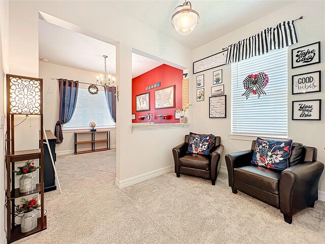 9071 Woodland Forest Rd, Orlando, FL 32836 - living area featuring carpet flooring, a chandelier, and healthy amount of natural light