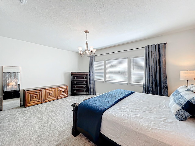 9071 Woodland Forest Rd, Orlando, FL 32836 - bedroom with carpet floors and a chandelier