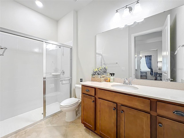 9071 Woodland Forest Rd, Orlando, FL 32836 - bathroom featuring a shower stall, vanity, and tile patterned flooring