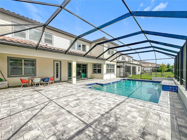 9071 Woodland Forest Rd, Orlando, FL 32836 - swimming pool featuring a patio area and a lanai