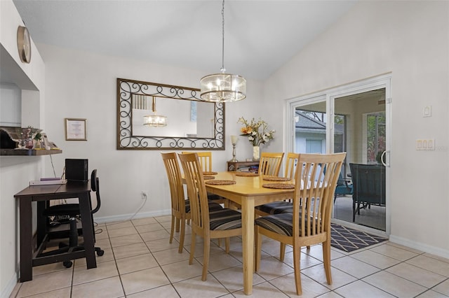 909 Troon Cir, Davenport, FL 33897 - dining space with vaulted ceiling, a chandelier, light tile patterned floors, and a desk