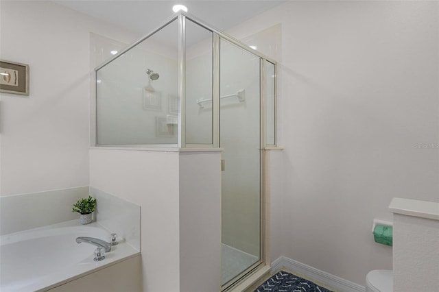 909 Troon Cir, Davenport, FL 33897 - bathroom with a shower stall and a bath