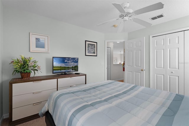 909 Troon Cir, Davenport, FL 33897 - bedroom with a closet and a ceiling fan