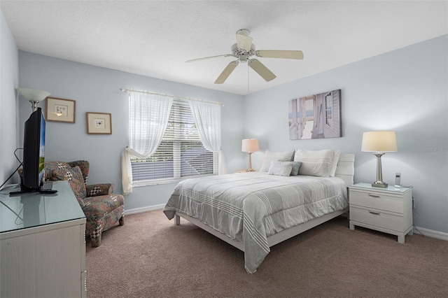 909 Troon Cir, Davenport, FL 33897 - bedroom featuring carpet floors and ceiling fan