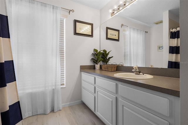 909 Troon Cir, Davenport, FL 33897 - bathroom with vanity and a shower with curtain